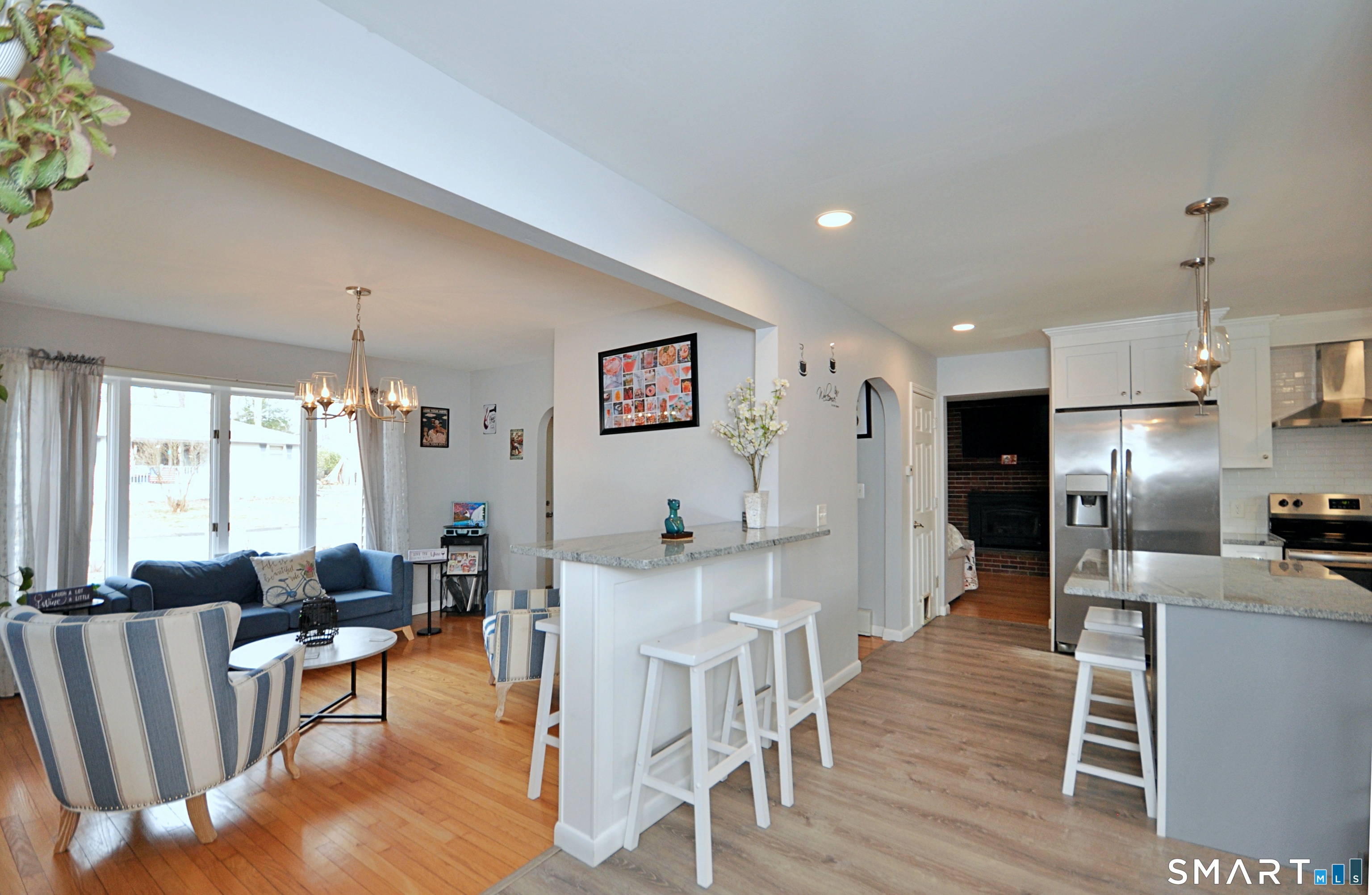 21 Maple Drive Prospect, CT 06712 - Photo 4 of 29 a living room with furniture a dining table and chairs
