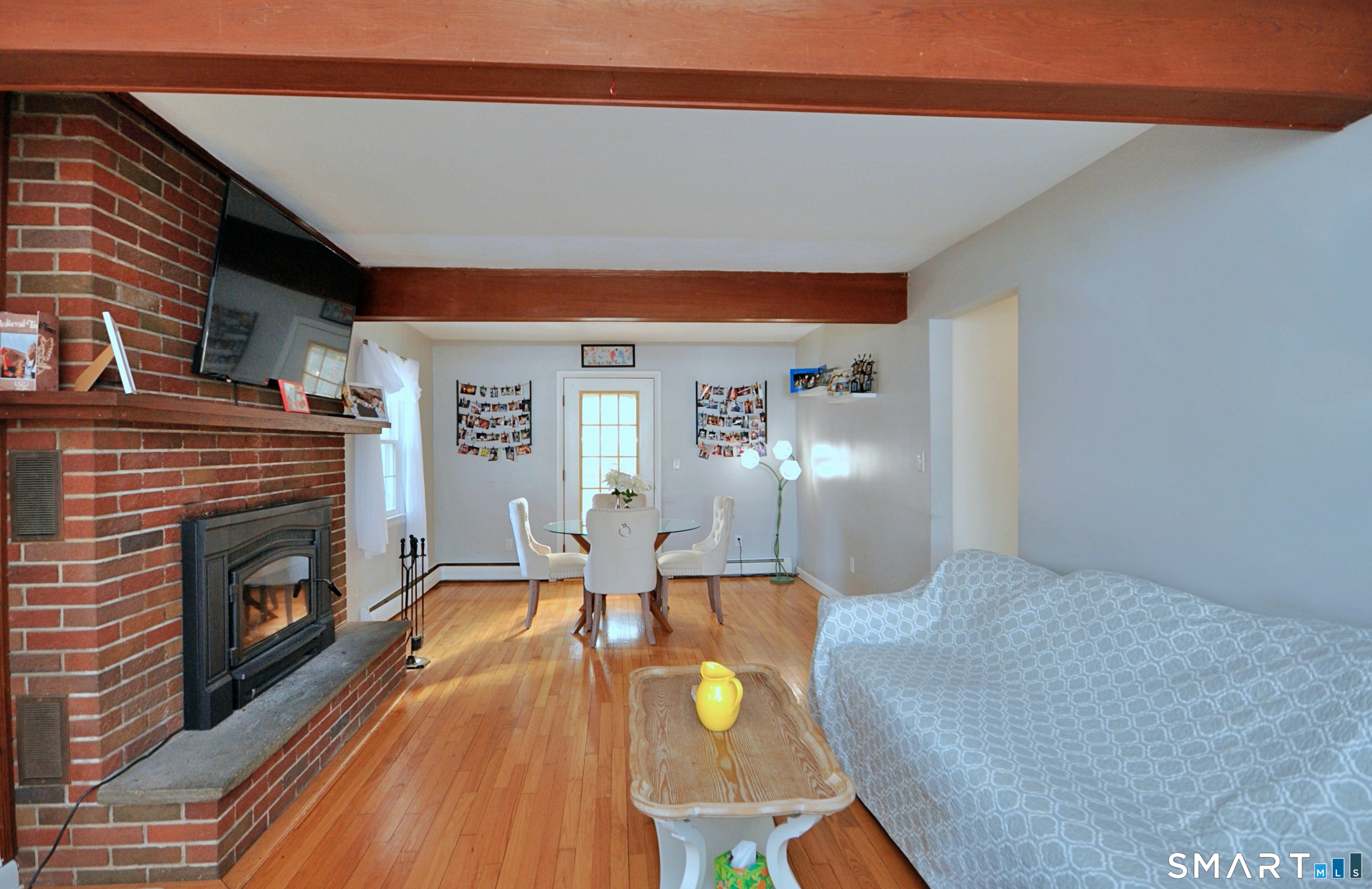 21 Maple Drive Prospect, CT 06712 - Photo 7 of 29 a living room with furniture and a fireplace