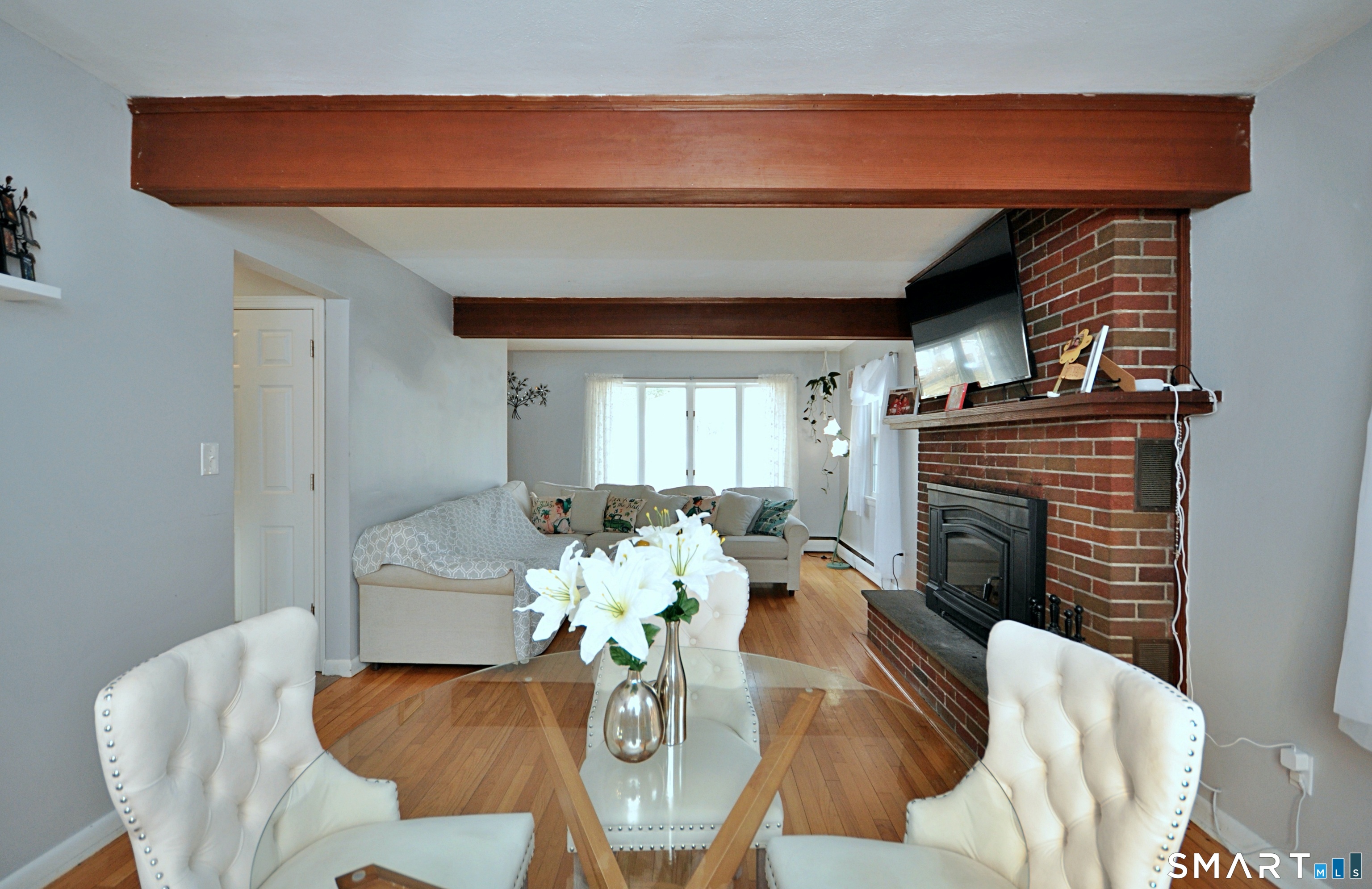 21 Maple Drive Prospect, CT 06712 - Photo 9 of 29 a view of a dining room with furniture window and wooden floor
