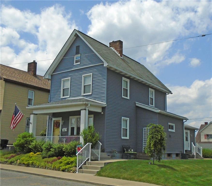 480 Heller Street Rochester, PA 15074 - Photo 1 of 31 a front view of a house with garden