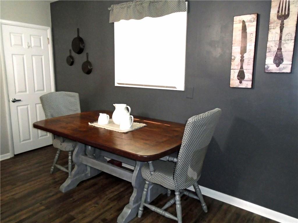 480 Heller Street Rochester, PA 15074 - Photo 11 of 31 a view of a dining room with furniture and wooden floor
