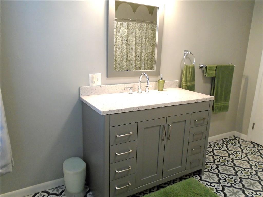 480 Heller Street Rochester, PA 15074 - Photo 24 of 31 a bathroom with a sink and a mirror