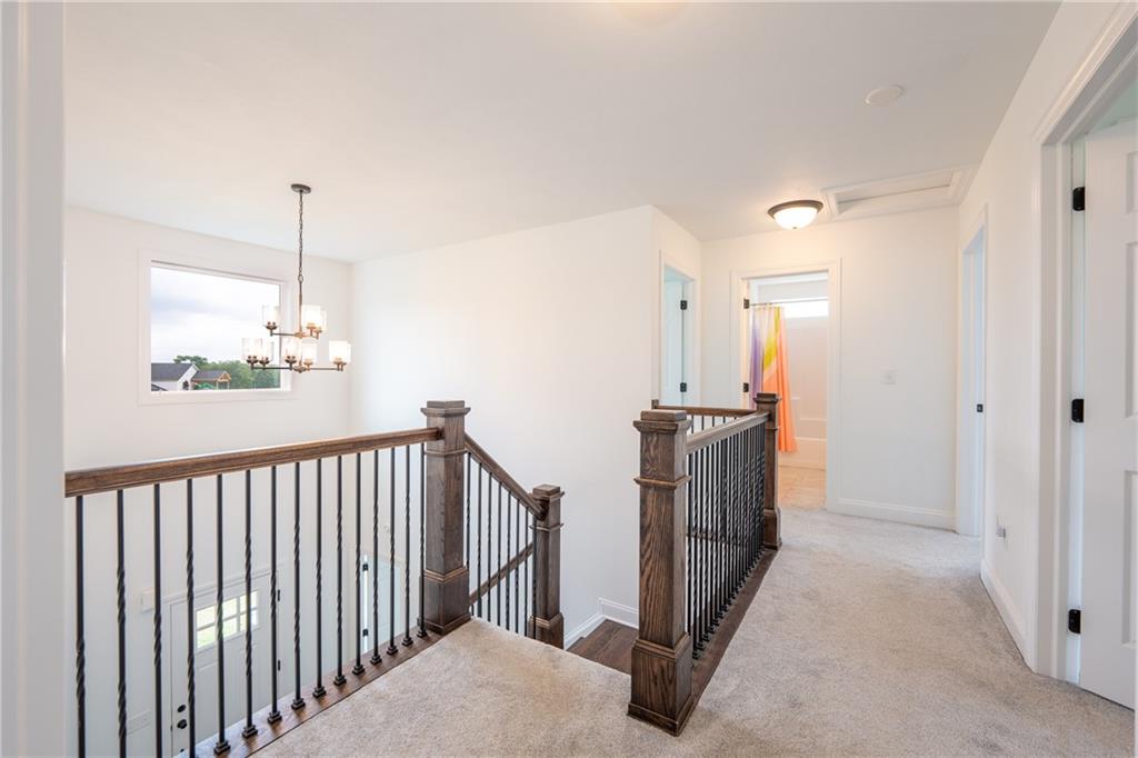 356 Stone Church Road Hunker, PA 15639 - Photo 16 of 40 a view of a hallway with windows