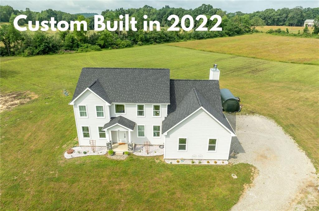 356 Stone Church Road Hunker, PA 15639 - Photo 2 of 40 a view of house with outdoor space and river