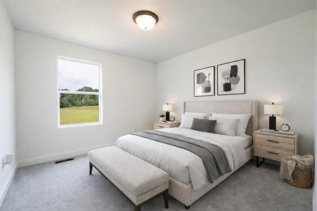 356 Stone Church Road Hunker, PA 15639 - Photo 21 of 40 a bedroom with bed and a window