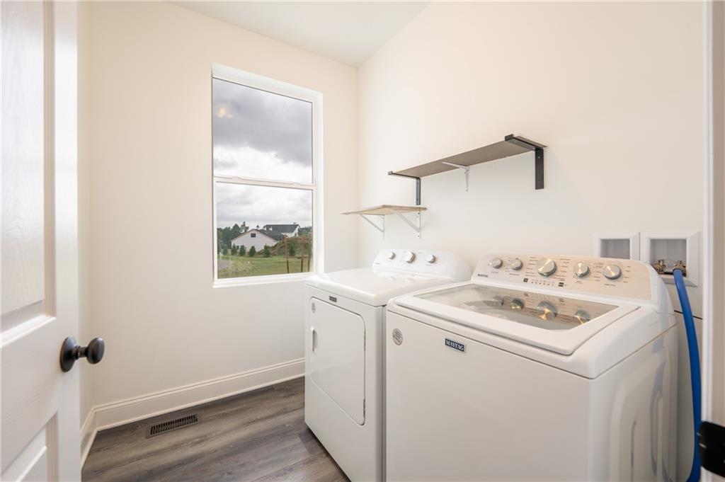 356 Stone Church Road Hunker, PA 15639 - Photo 27 of 40 a utility room with dryer and washer