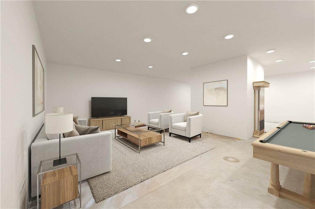 356 Stone Church Road Hunker, PA 15639 - Photo 30 of 40 a living room with furniture and a flat screen tv