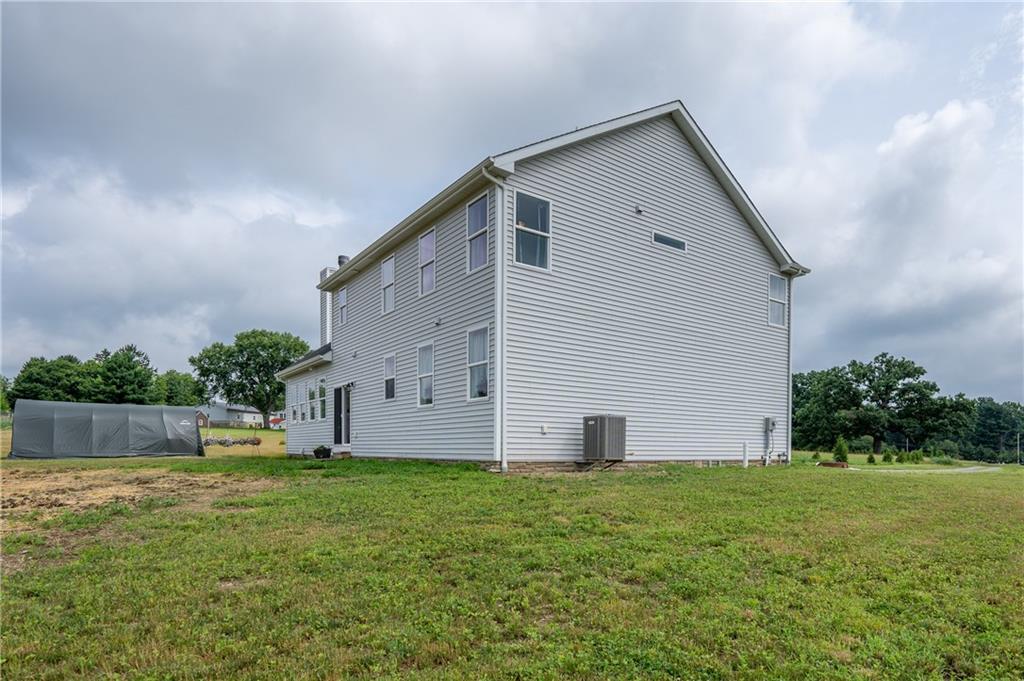 356 Stone Church Road Hunker, PA 15639 - Photo 37 of 40 a front view of house with garden