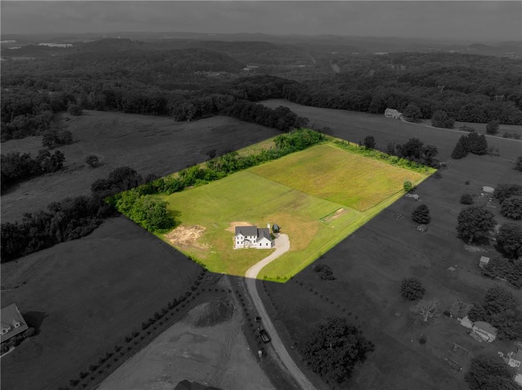 356 Stone Church Road Hunker, PA 15639 - Photo 40 of 40 an aerial view of a house with yard