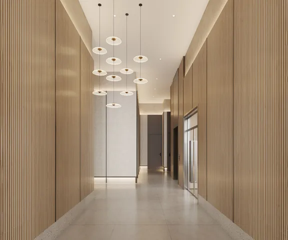 a view of a hallway with chandelier fan and glass door