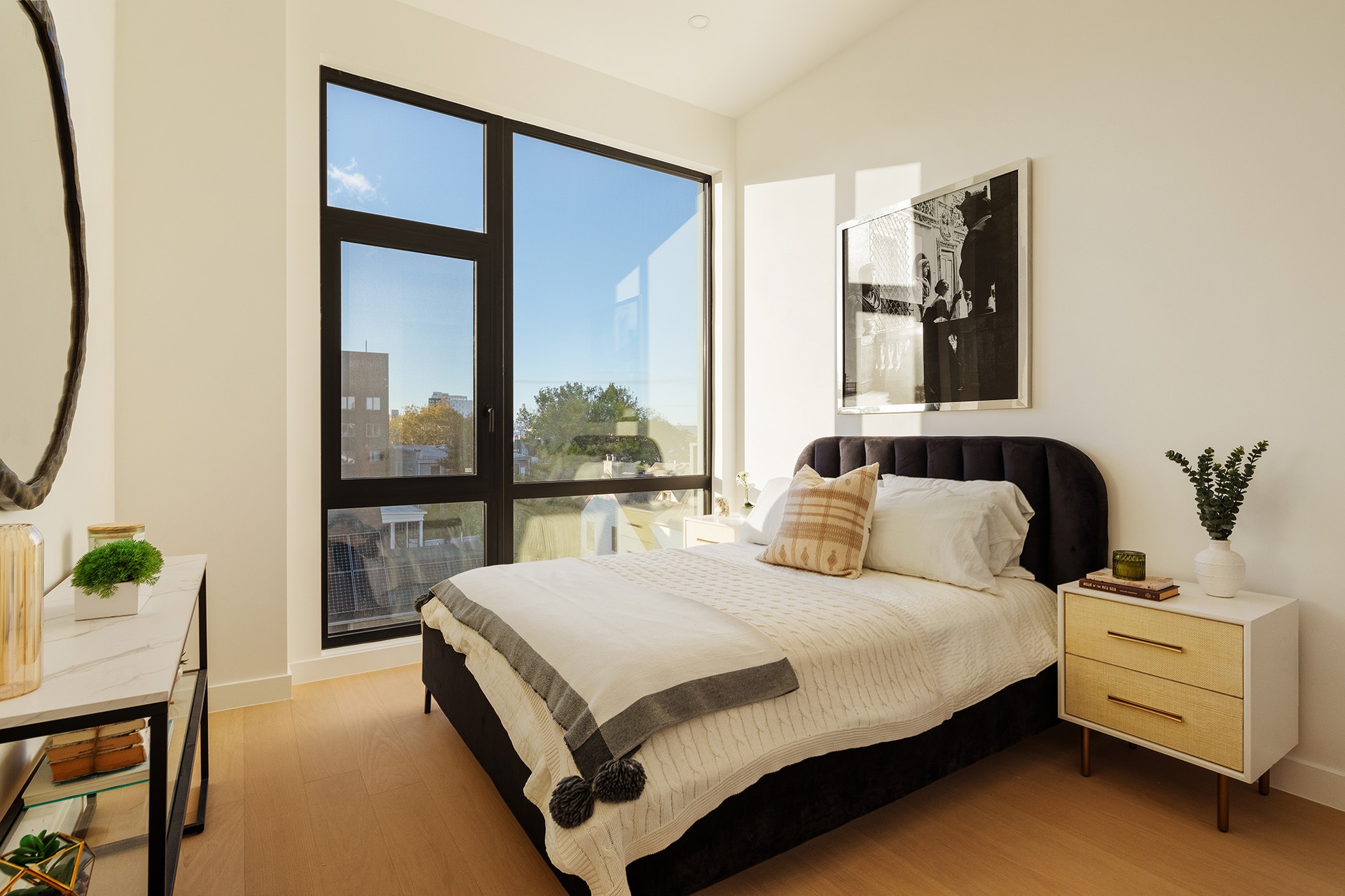 1027 Bushwick Avenue, Unit 2D Brooklyn, NY 11221 - Photo 5 of 14 a bedroom with a bed and window