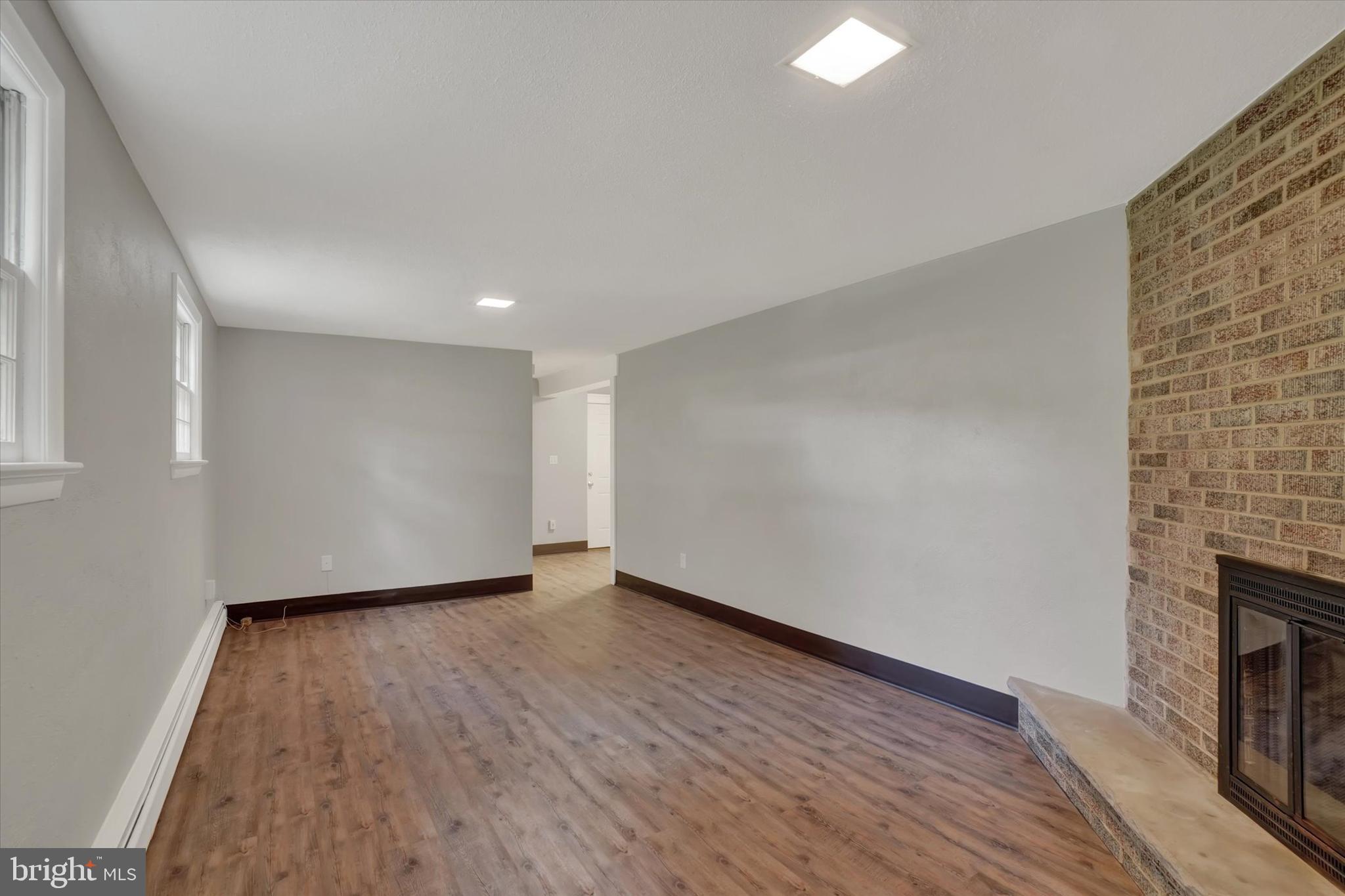 2720 Freysville Road Red Lion, PA 17356 - Photo 16 of 28 Rec room with corner fireplace