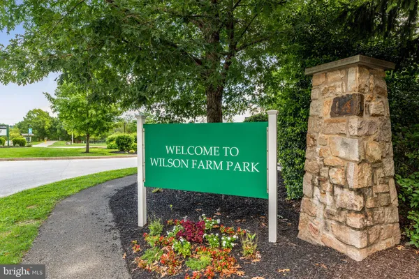 a view of a street with sign board