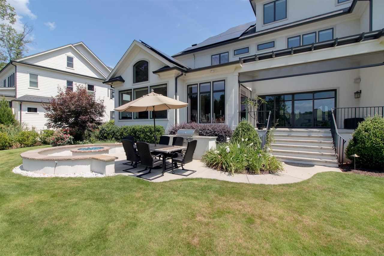 136 Turner Ridge Circle Durham, NC 27713 - Photo 30 of 30 a front view of a house with porch and garden