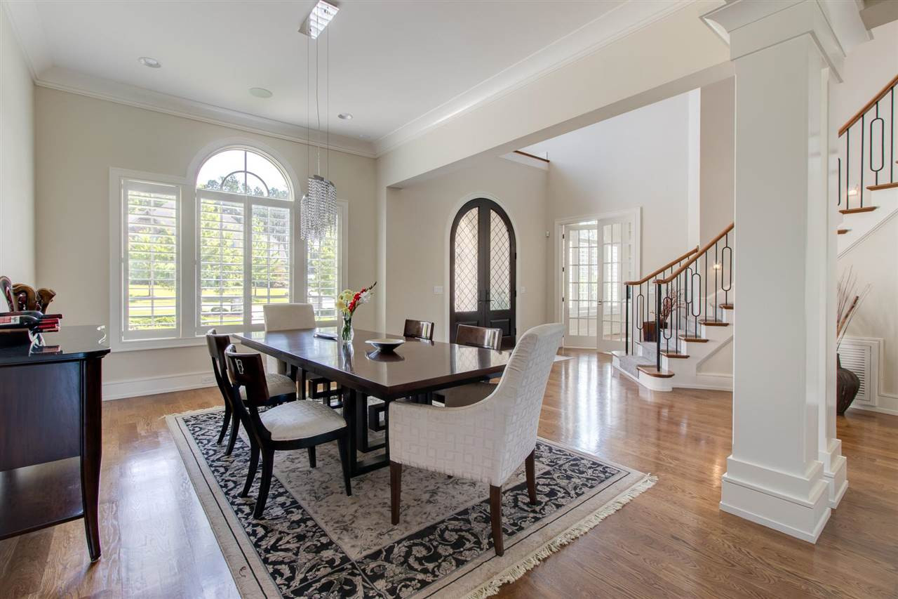 136 Turner Ridge Circle Durham, NC 27713 - Photo 4 of 30 a view of a dining room with furniture window and wooden floor