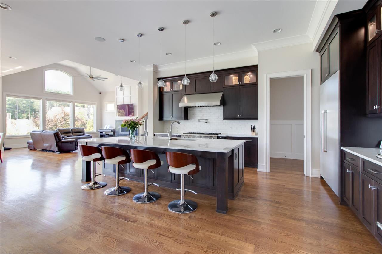 136 Turner Ridge Circle Durham, NC 27713 - Photo 7 of 30 a view of kitchen with kitchen island dining table and chairs