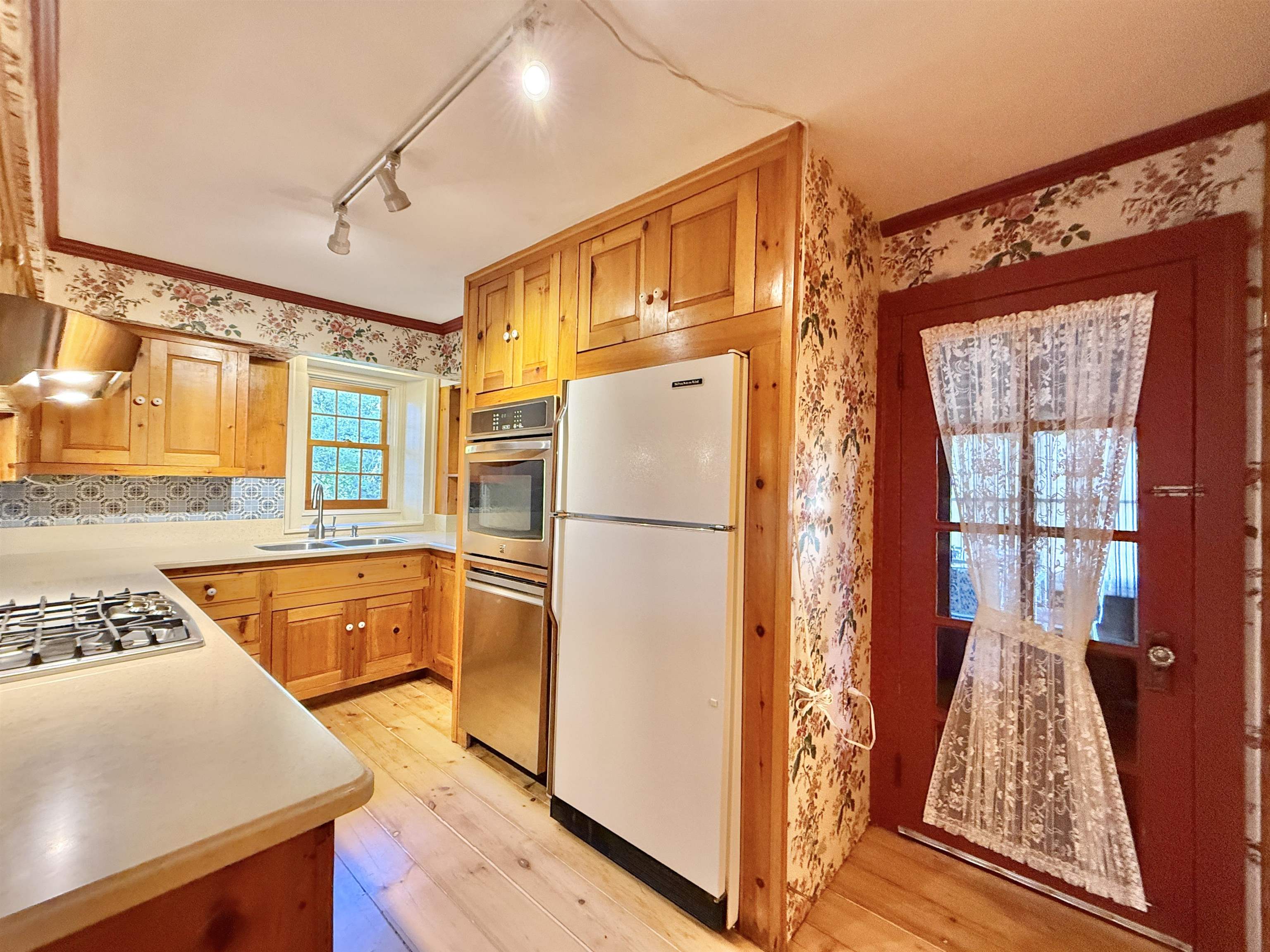 702 Washington Street Rockton, IL 61072 - Photo 19 of 29 a kitchen with stainless steel appliances granite countertop a refrigerator and a stove