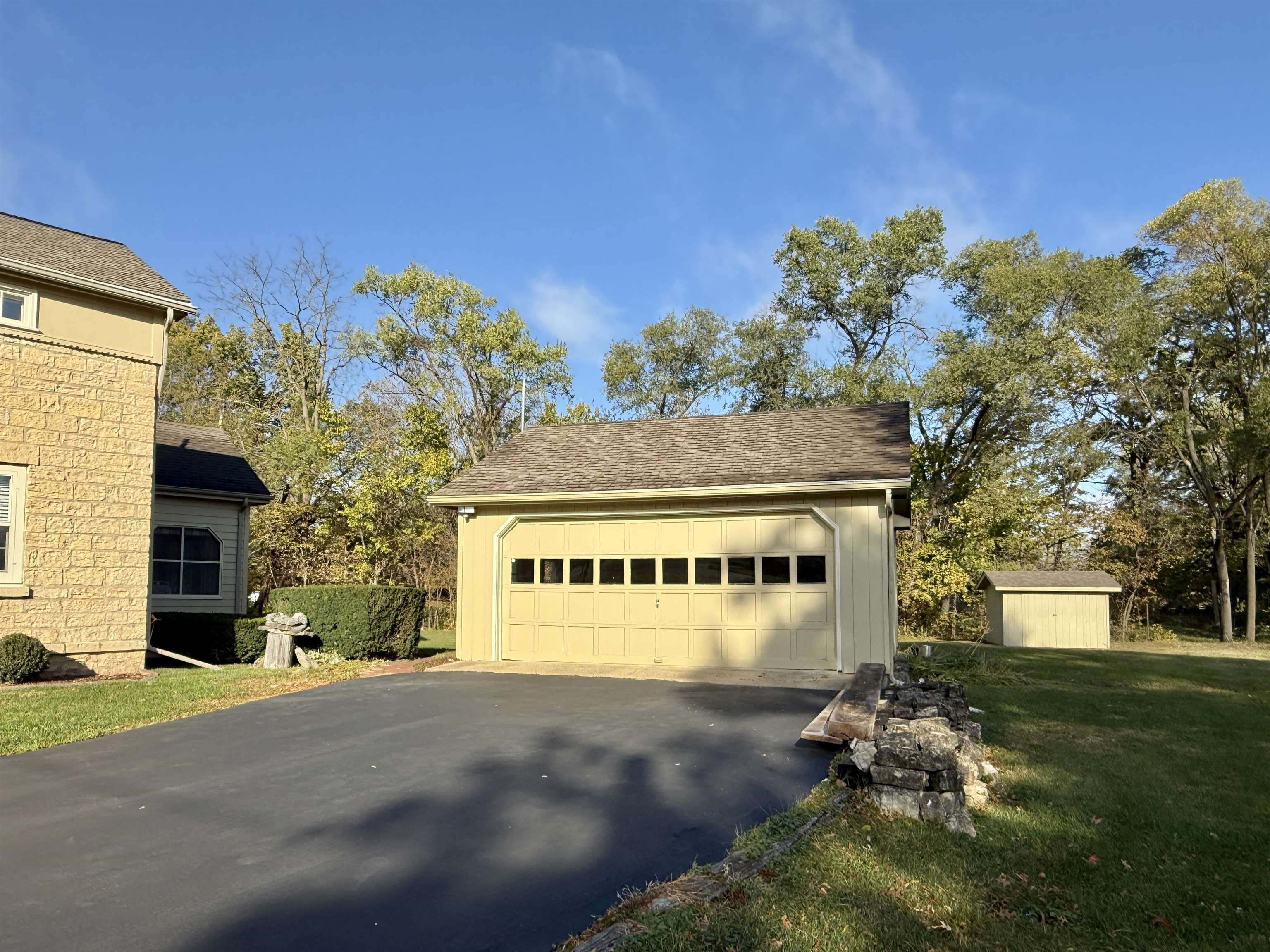 702 Washington Street Rockton, IL 61072 - Photo 2 of 29 a front view of a building with garden