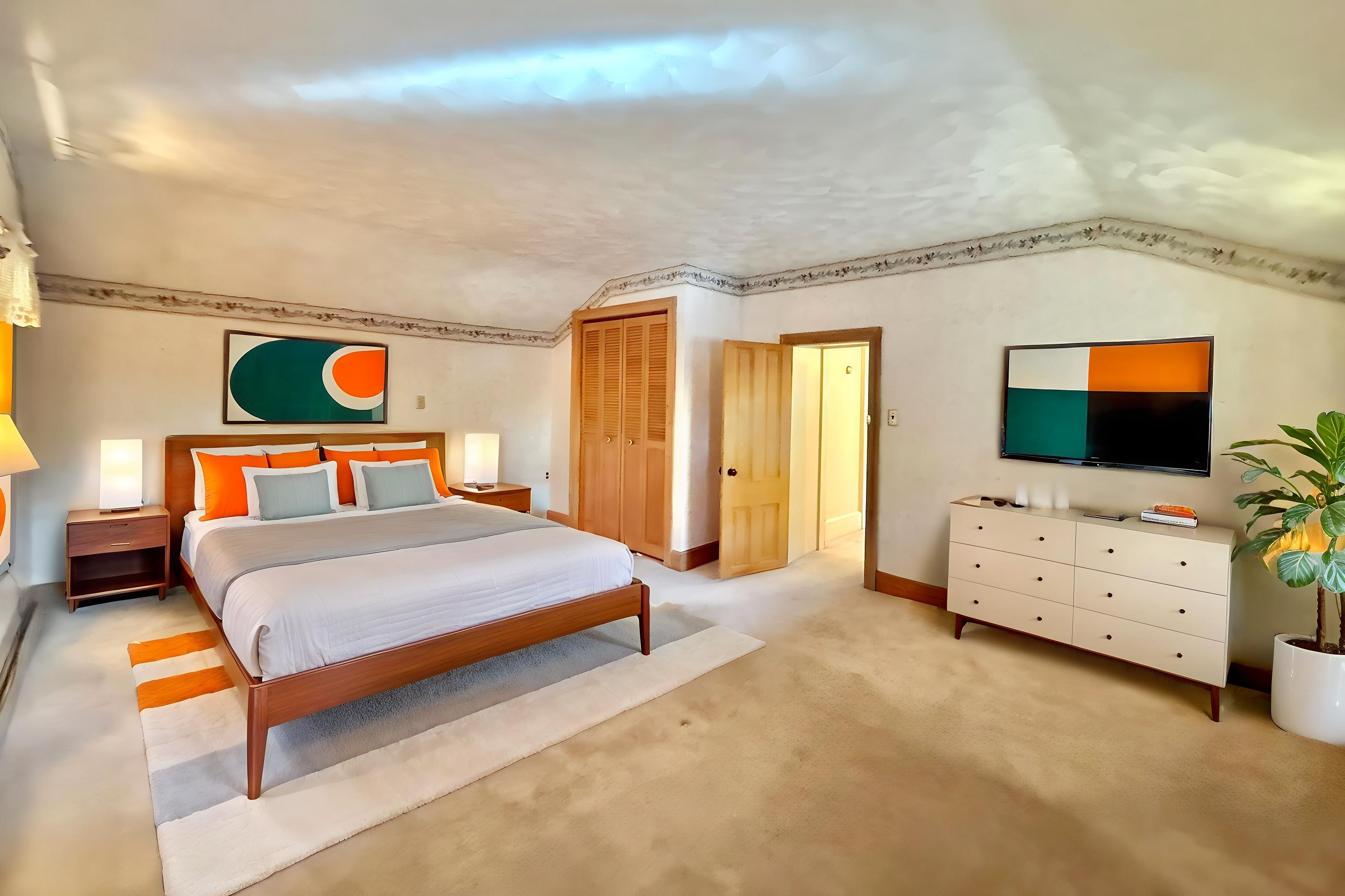 702 Washington Street Rockton, IL 61072 - Photo 27 of 29 a bedroom with furniture and flat screen tv