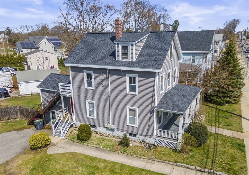 465 High Street, Unit 2 Dedham, MA 02026 - Photo 12 of 12 front view of a house with a yard