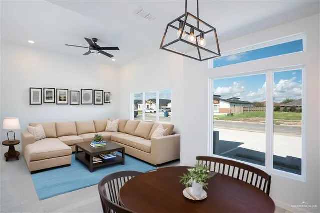 a living room with furniture and a window
