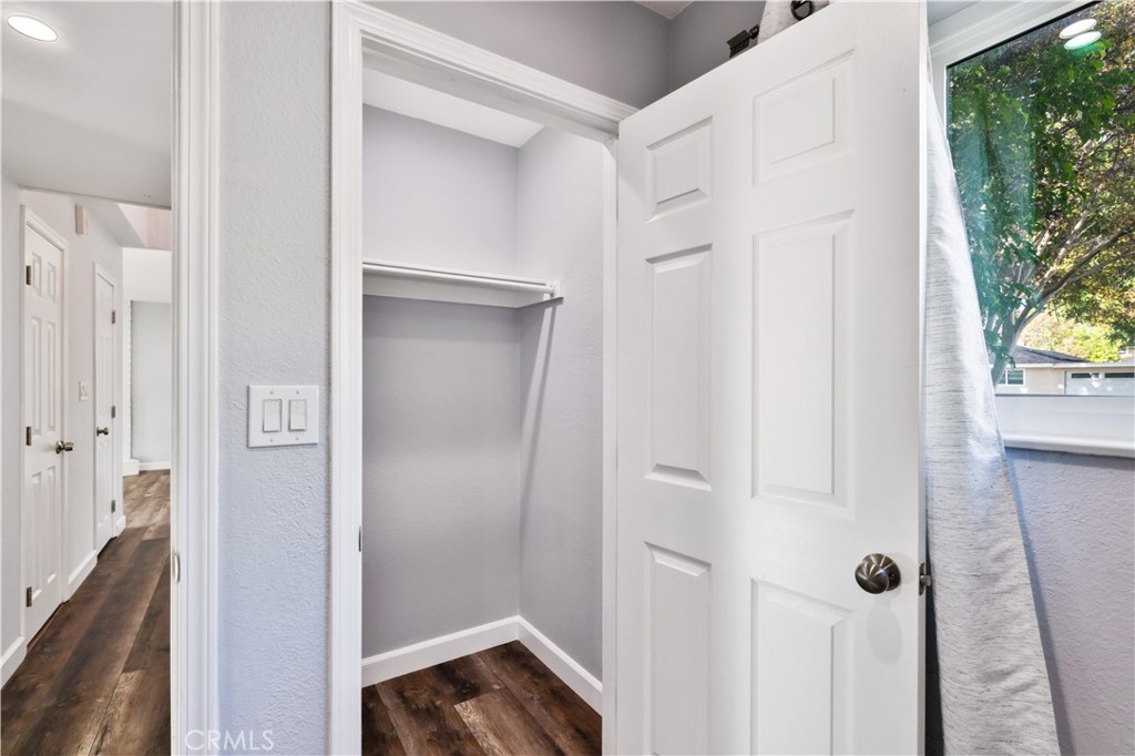 2702 College Lane La Verne, CA 91750 - Photo 12 of 53 a view of a hallway with wooden floor and closet