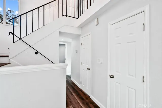 a view of a hallway with staircase
