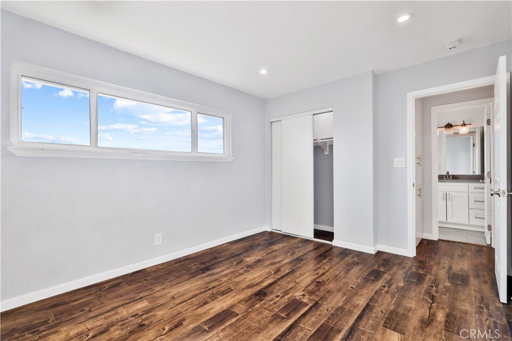2702 College Lane La Verne, CA 91750 - Photo 21 of 53 a view of empty room with wooden floor and fan