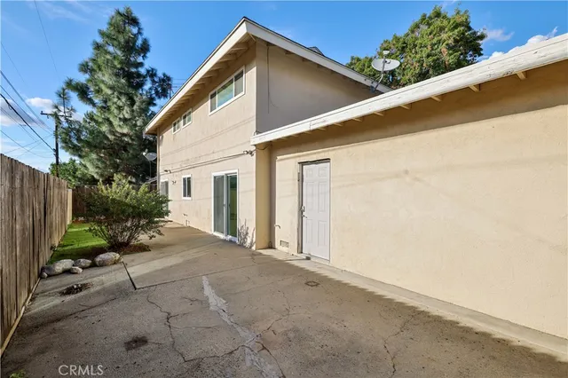a view of a city with lots of residential buildings and mountain view in back