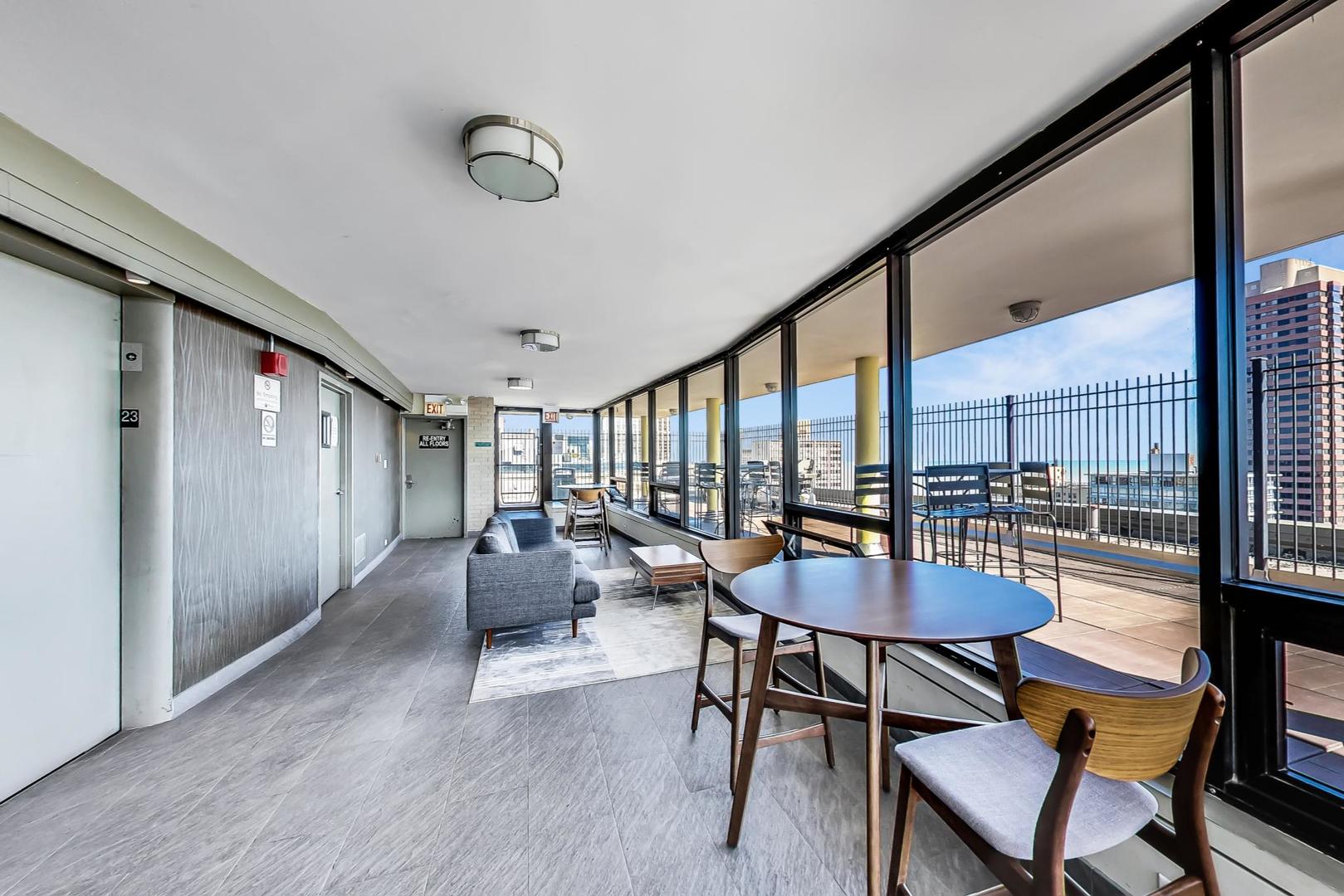 2930 North Sheridan Road, Unit 811 Chicago, IL 60657 - Photo 40 of 52 a outdoor space with furniture and a potted plant