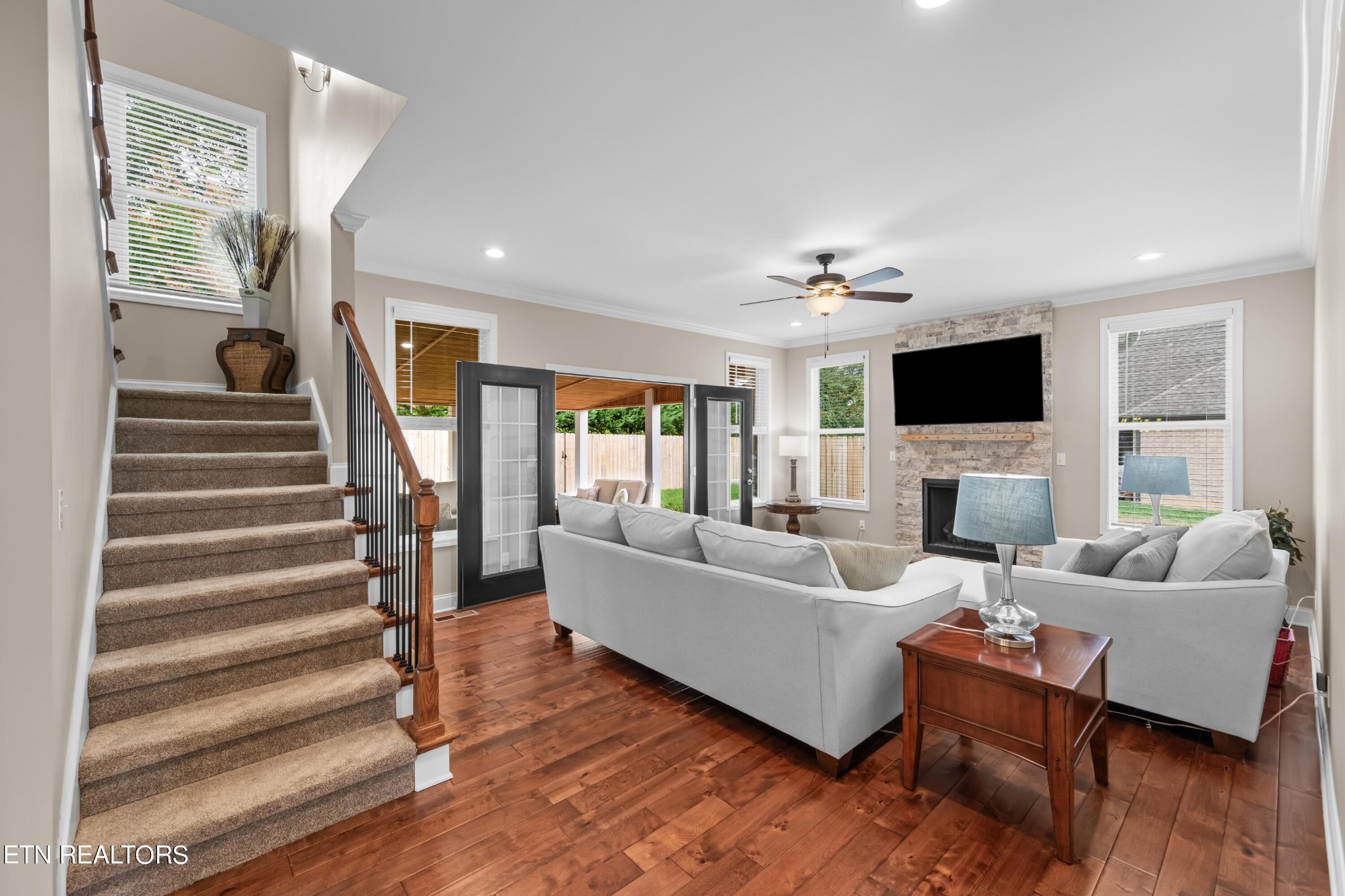 107 Crossroads Boulevard Oak Ridge, TN 37830 - Photo 2 of 23 a living room with furniture and a flat screen tv