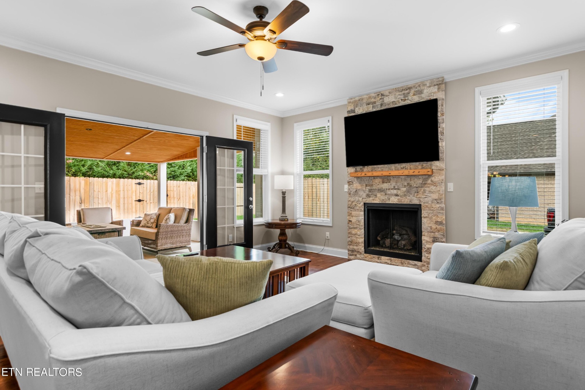 107 Crossroads Boulevard Oak Ridge, TN 37830 - Photo 3 of 23 a living room with furniture fireplace and a flat screen tv