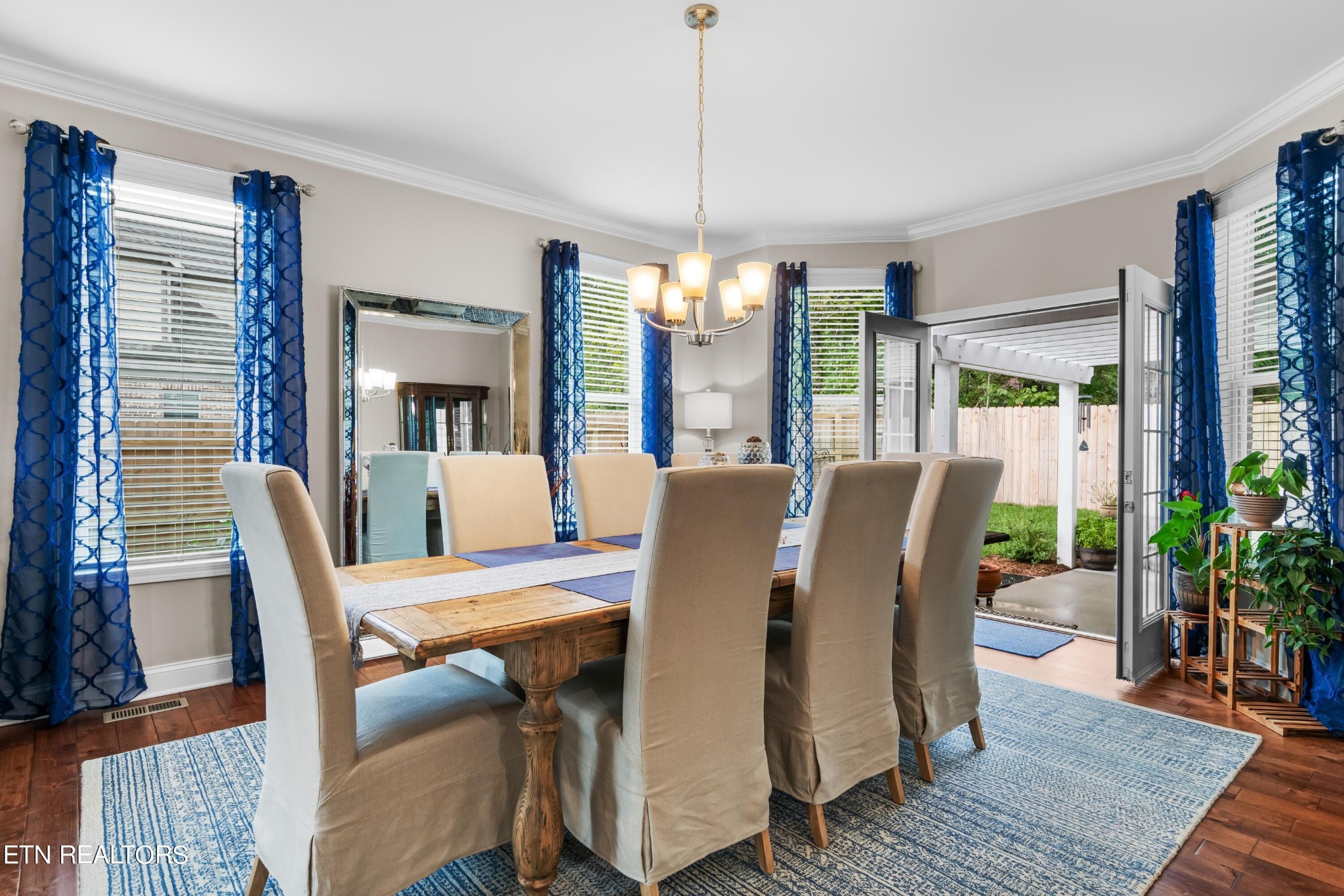 107 Crossroads Boulevard Oak Ridge, TN 37830 - Photo 5 of 23 a view of a dining room with furniture window and wooden floor