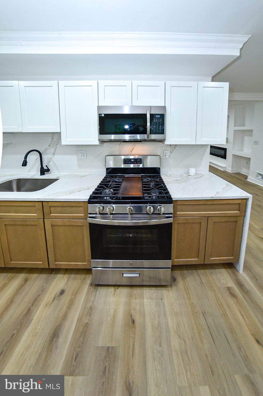 3704 Suitland Road Southeast Washington, DC 20020 - Photo 13 of 70 Modern kitchen with sleek finishes.