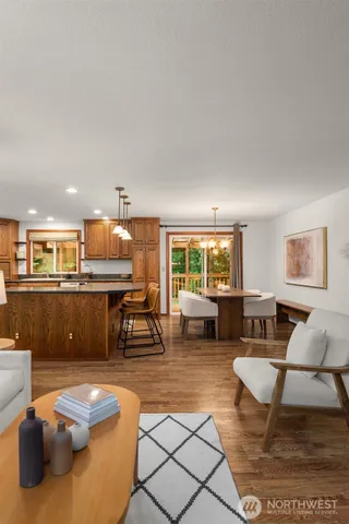 a living room with furniture and a table