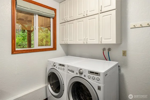 a view of a balcony with wooden floor
