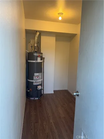 a bedroom with a bed and a table