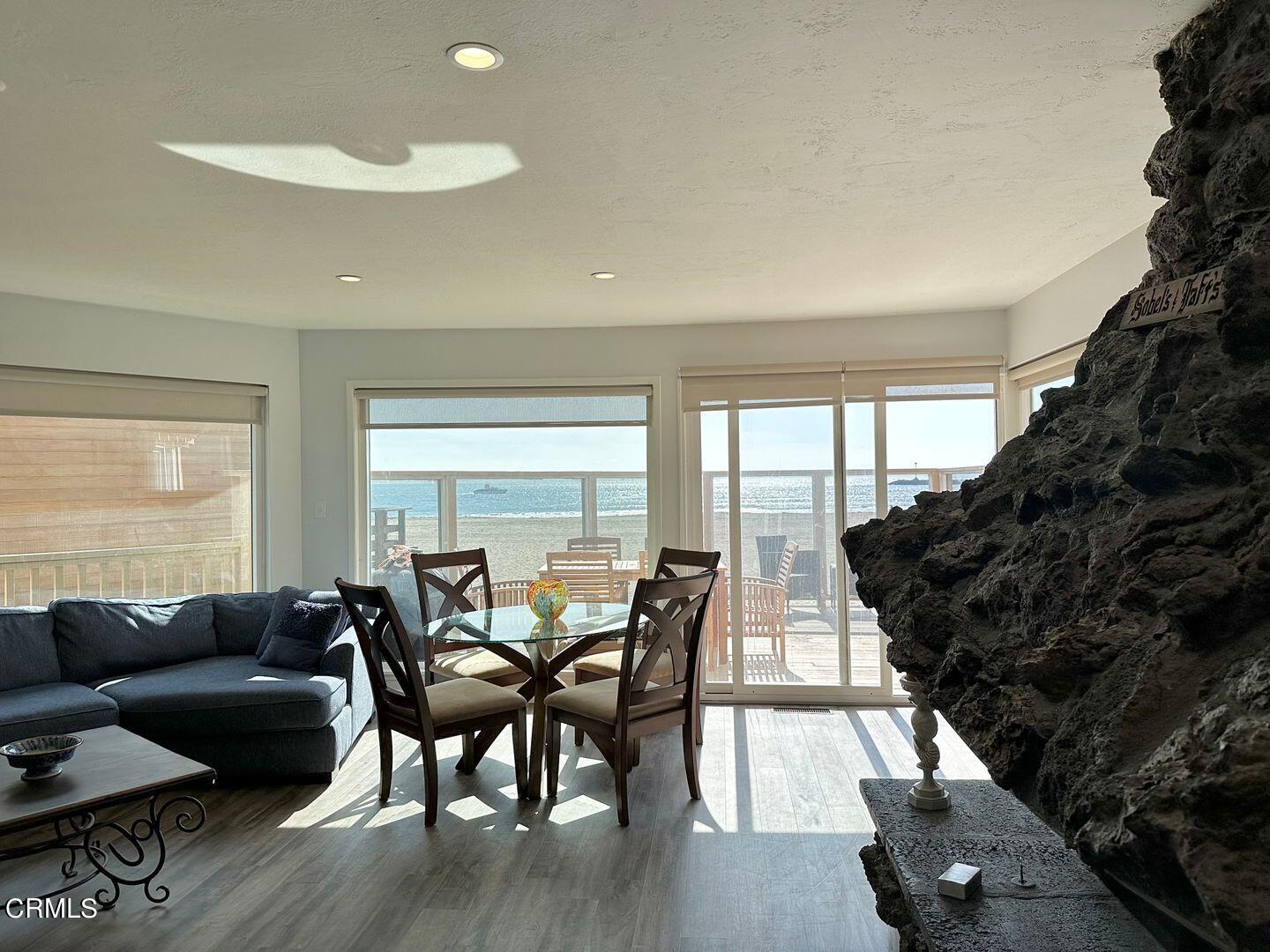 2201 Ocean Drive Oxnard, CA 93035 - Photo 12 of 30 a living room with furniture and wooden floor