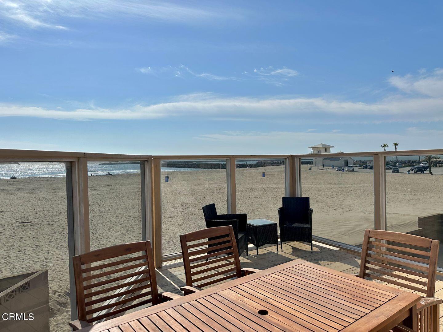 2201 Ocean Drive Oxnard, CA 93035 - Photo 14 of 30 a roof deck with wooden floor and barbeque oven