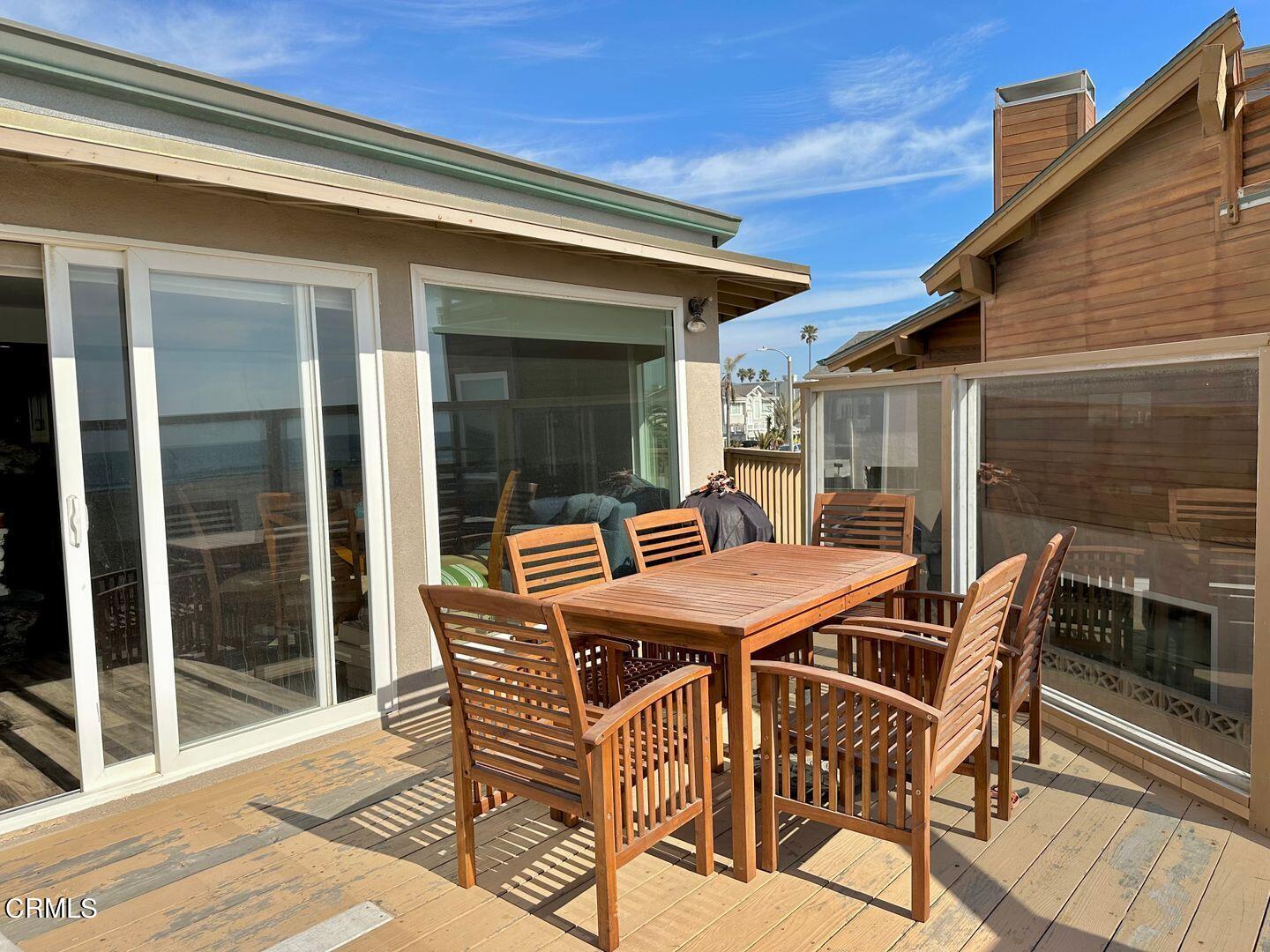 2201 Ocean Drive Oxnard, CA 93035 - Photo 15 of 30 a patio with table and chairs