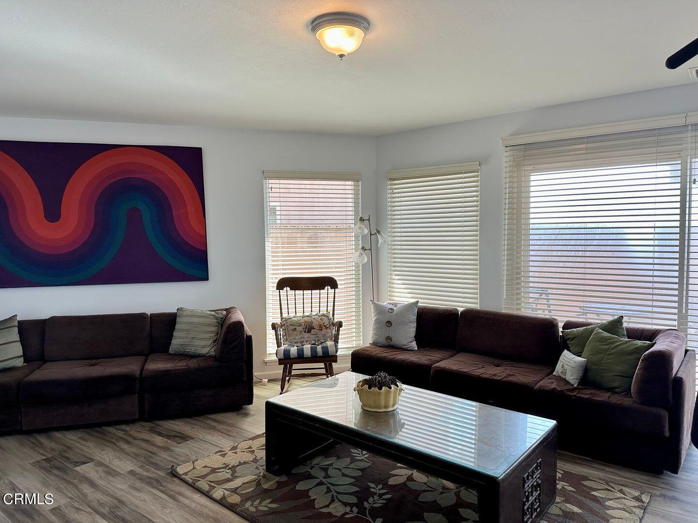 2201 Ocean Drive Oxnard, CA 93035 - Photo 25 of 30 a living room with furniture and a window