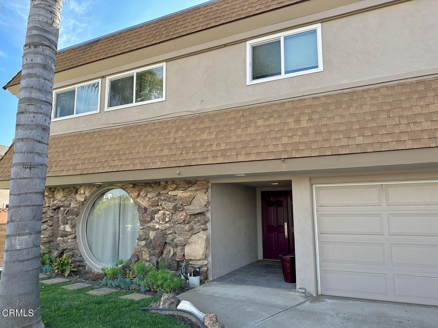 2201 Ocean Drive Oxnard, CA 93035 - Photo 29 of 30 a front view of a house with garden