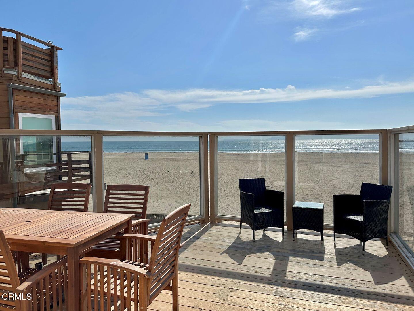 2201 Ocean Drive Oxnard, CA 93035 - Photo 30 of 30 a roof deck with table and chairs