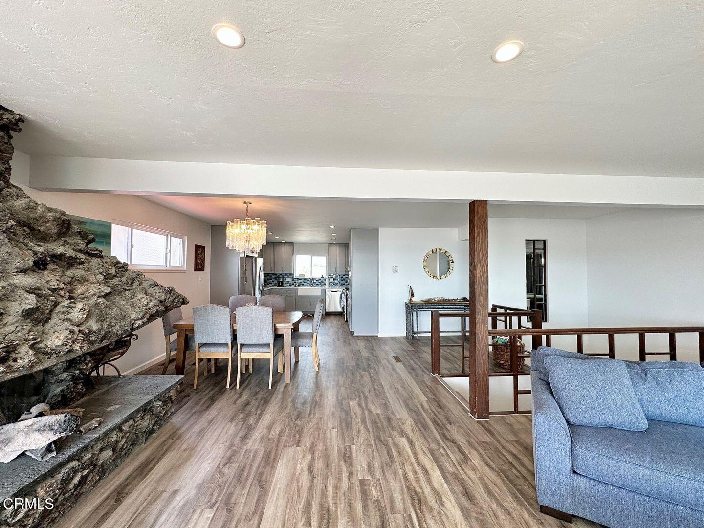 2201 Ocean Drive Oxnard, CA 93035 - Photo 8 of 30 a living room with furniture and wooden floor
