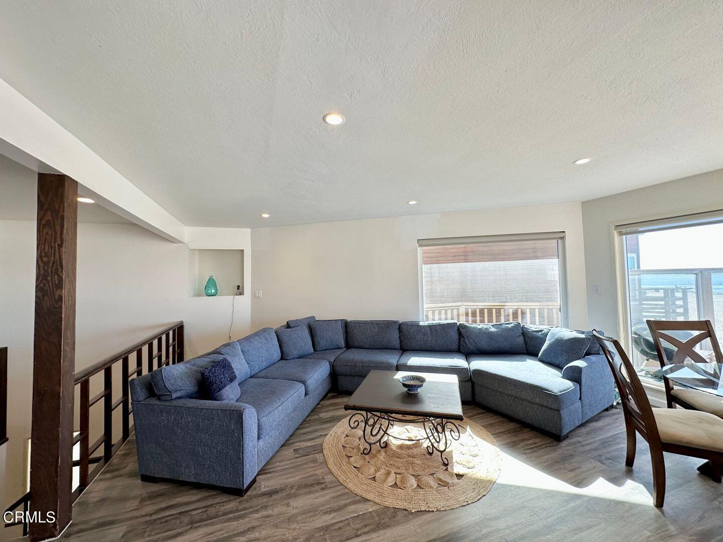 2201 Ocean Drive Oxnard, CA 93035 - Photo 10 of 30 a living room with furniture and a couch