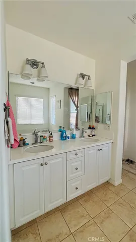 a room with mirror and sink