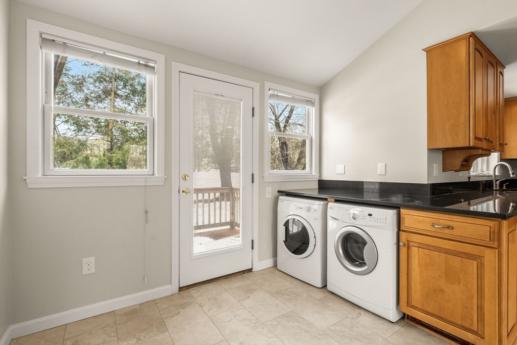 630 Pleasant Street Canton, MA 02021 - Photo 11 of 31 a utility room with dryer and washer