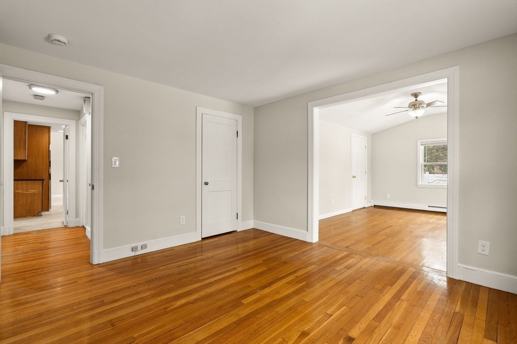 630 Pleasant Street Canton, MA 02021 - Photo 17 of 31 a view of an empty room with wooden floor