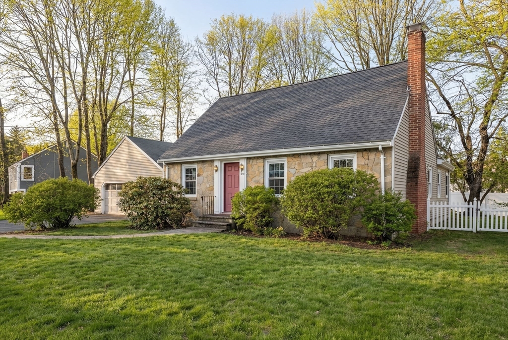 630 Pleasant Street Canton, MA 02021 - Photo 2 of 31 a front view of house with yard and green space