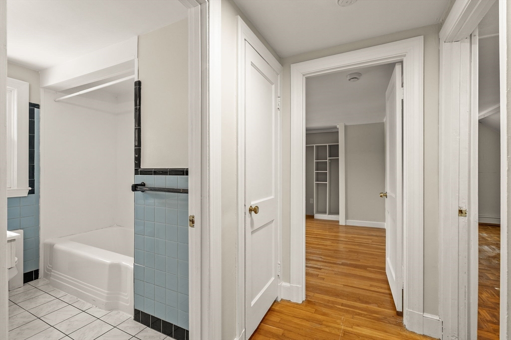 630 Pleasant Street Canton, MA 02021 - Photo 28 of 31 a bathroom with a tub and shower